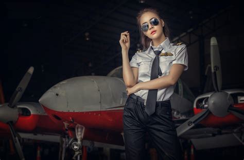 beautiful female pilot wallpaper|Download Fearless Female Aviator Wallpaper.